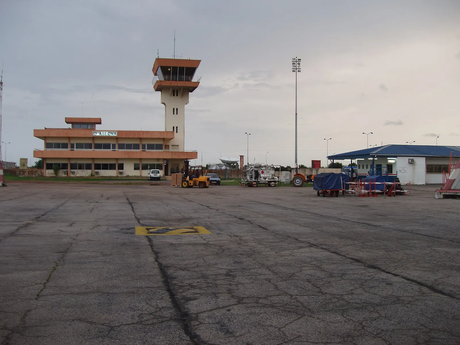 Terminal and control tower of Port-Gentil airport seen from the apron