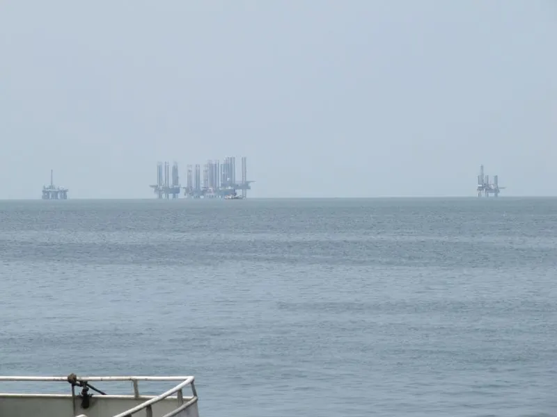 Oil platforms and installations visible offshore from Port-Gentil